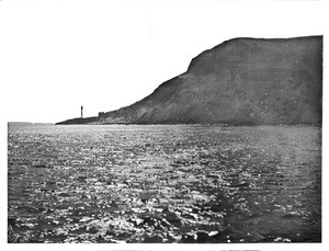 View of Point Loma across the water, showing the lighthouse, ca.1900
