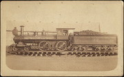 [Central Pacific Railroad steam locomotive No. 77 and crew]