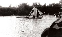 Four people with boat on Lake Jonive, Sebastopol