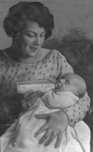 Mildred Berman feeding her baby