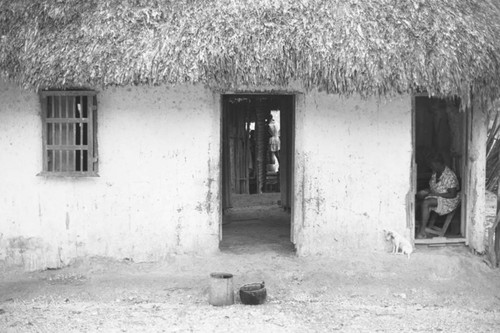 Woman sitting inside a house, San Basilio de Palenque, 1976