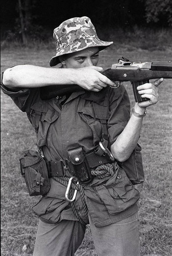 Survival school student holds a gun, Liberal, 1982