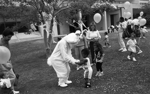 Easter Bunny greeting a child, Los Angeles, 1987