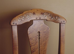 Rocking chair of maple, detail of inlay on back
