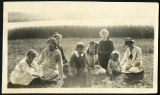 Photograph of Genay family with friends