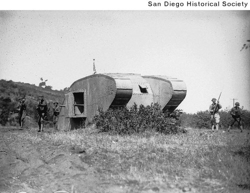 Infantry soldiers and a tank conducting maneuvers at Fort Rosecrans