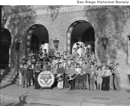 The YMCA Boys Band outside the YMCA building