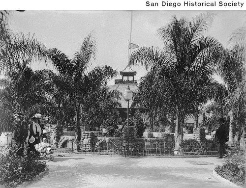 A man and a woman pushing a baby in a stroller at the Mission Cliff Gardens