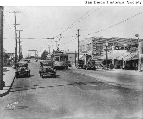 Automobiles and a streetcar on an East San Diego Street