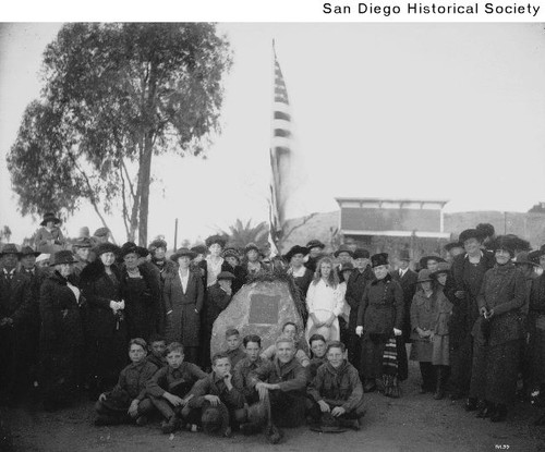 Dedication of the End of the Kearny Trail marker with a group of Boy Scouts seated under the marker