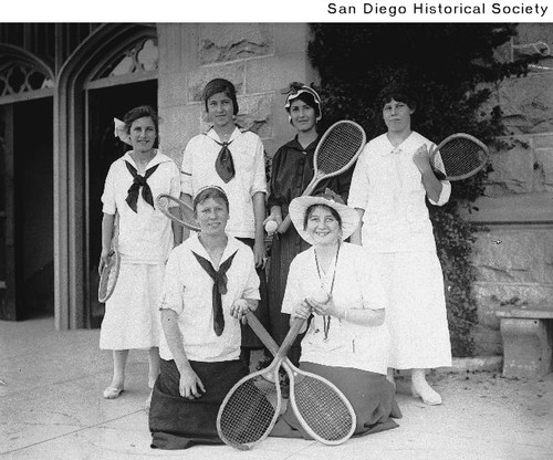 Members of a high school girls tennis team