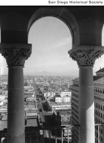 View of San Diego looking east through the arches on the roof of the San Diego Trust & Savings Bank at Sixth and Broadway