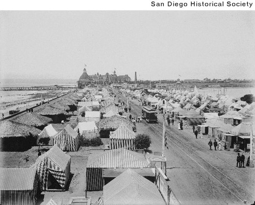 Coronado's Tent City with the Hotel del Coronado in the distance