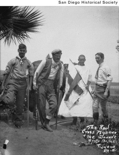 Two injured men and two Red Cross workers in Baja California during the Tijuana Insurrection of 1911