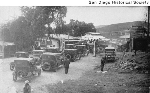 Line of automobiles at the US Customs inspection station waiting to return from Mexico