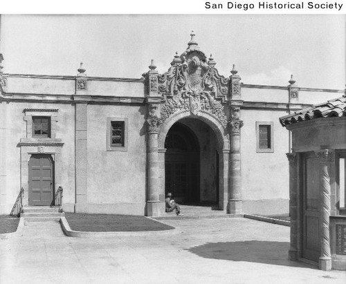 A man sitting on the steps of the Mission Beach Plunge