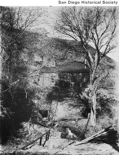 Men near a doorway at the Redman Mine in Julian