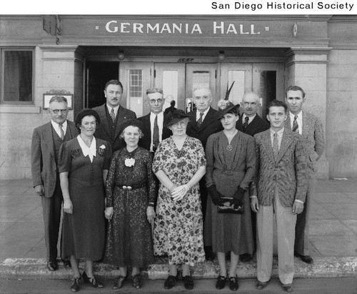 Members of the Concordia Turnverein standing at the entrance to Germania Hall