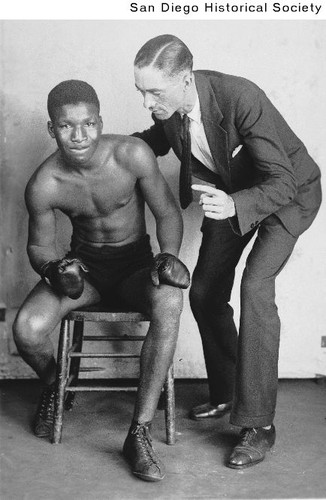 Boxer Young Harry Wills and his coach Tom Scott