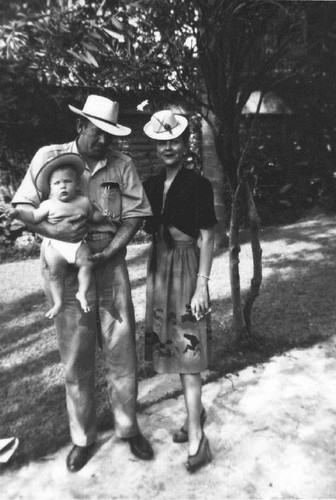 New straw hats [John Steinbeck and family, 1945]