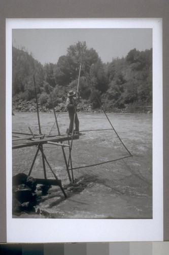 Man fishing from platform