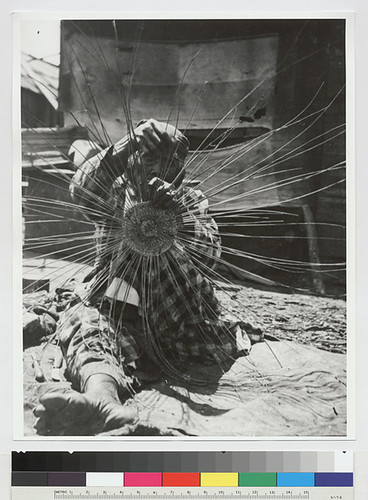 Woman making basket