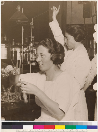 [Alice Potter and Marion Mills at work in laboratory, University of California.]