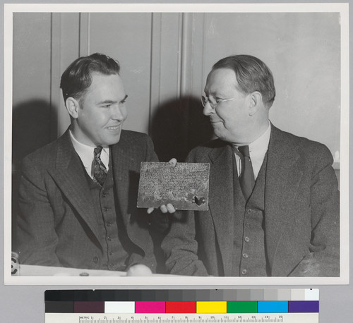 [Herbert E. Bolton and Bergil Shinn with Drake's Plate of Brass.]