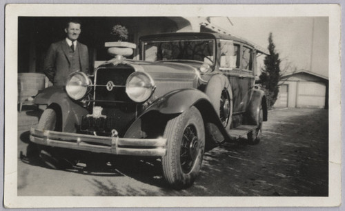 Charlie and his car, 1930