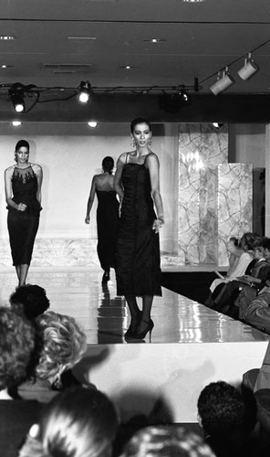 Model posing on a runway during a fashion show, Los Angeles, 1986