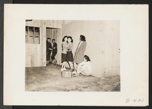 Arcadia, Calif.--Impromptu dancing at Santa Anita Park assembly centers for evacuees of Japanese ancestry. Evacuees are transferred later to War Relocation Authority centers for the duration. Photographer: Albers, Clem Arcadia, California