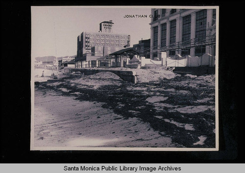 Santa Monica tide studies at the Kenter Canyon outlet looking north to the Jonathan Club and the Grand Hotel with tide 4.8 feet on March 4, 1938 at 9:55 AM