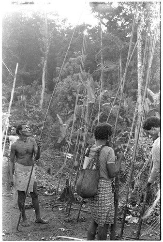 Giving shell money valuables; man at left in is Tafulau, elder brother of Nene'au So'ogeni