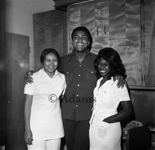 Muhammad Ali visits hospital, Los Angeles, 1975