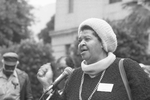 Mary B. Henry addressing a crowd in front of City Hall, Los Angeles, 1986