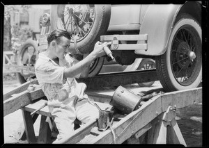 Old and new methods of greasing cars, Southern California, 1931