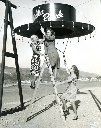 Promotional photo for the Malibu Remuda with giant hat entrance sign, 1947
