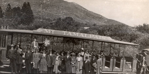 Riders leave the Mt. Tamalpais Railroad at West Point, on their way to the Mountain Theater, 1914 [photograph]