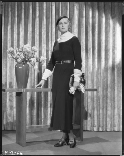 Peggy Hamilton modeling a mid-calf length dress, 1933