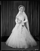 Peggy Hamilton modeling an Earl Luck wedding dress, 1931