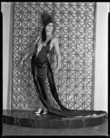 Peggy Hamilton modeling a Max Rée gown worn by actress Maria Corda in the movie Love and the Devil, 1929