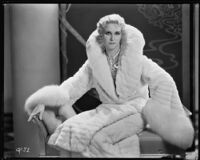 Peggy Hamilton modeling an ermine coat, 1931