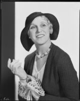 Peggy Hamilton modeling a Hortense hat with a wide brim, 1931