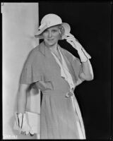 Peggy Hamilton modeling a dress, hat and gloves, 1932