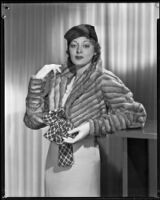 Actress Kathleen Burke modeling fur jacket from Beckman's, 1933