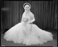 Peggy Hamilton modeling an Earl Luck wedding dress, 1931