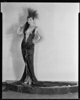 Peggy Hamilton modeling a Max Rée gown worn by actress Maria Corda in the movie Love and the Devil, 1929