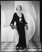 Peggy Hamilton modeling a long dress of chiffon velvet and Alençon lace, 1930