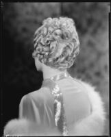 Peggy Hamilton modeling a formal coiffure hairstyle by Weaver Jackson's Salon, 1933