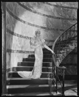 Peggy Hamilton modeling a Max Rée gown as "Queen Olympia," 1931